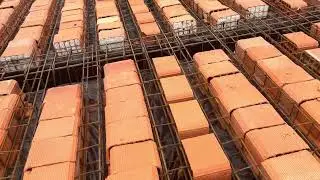 Ribbed slab with clay port slab for economic construction