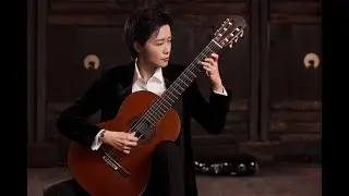 Enter the musical world of guitarist Su Meng