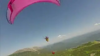 Daring Aerial Acrobatics: Paraglider Duo Stuns Over Siberia’s Forests