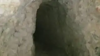 Strange Hooded Figure Spotted in Cave Expedition