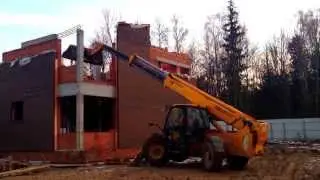 Погрузчик с телескопической стрелой