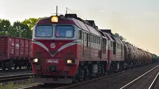 Diesel locomotive 2M62K-1059 with a freight train