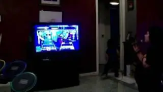 Maggie singing as we play rock band.