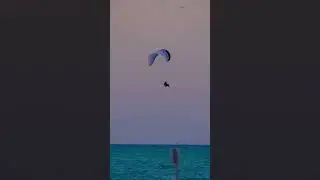Paramotor taking off from the Haulover Naturist beach in Miami, Florida