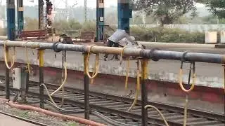 Throwing Parcel from one platform to another at Rly Platform...