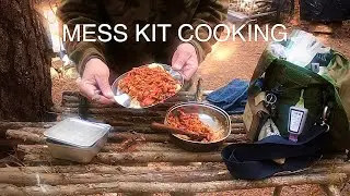 MESS KIT COOKING AT BUSHCRAFT CAMP