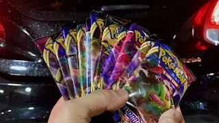 Opening Pokémon Cards While Blasting Music in Car in Parking Structure