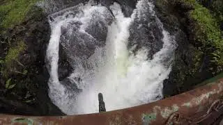 Heavy rain turns Hawaii stream into torrent.