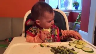 One year old eats cucumbers