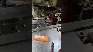 Redrilling cnc plasma cut holes.