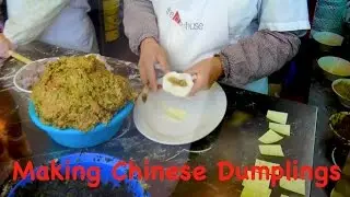 Making Chinese Dumplings In Chinatown