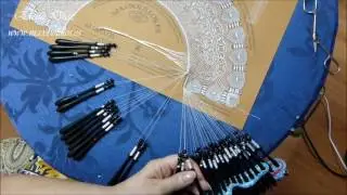 Encaje de bolillos. Rematar un Abanico