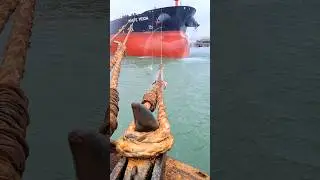 Close Up of Mooring Operation of a Large Oil Tanker