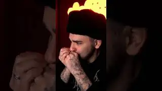 Юлик играет на губной гармошке