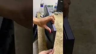 How to remove the back cover of an Acer monitor without screws 