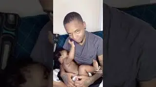 A transgender breastfeeding man