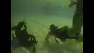 Female's holding breath underwater