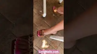 Breakfast in high heels sandals and neon pink long toenails
