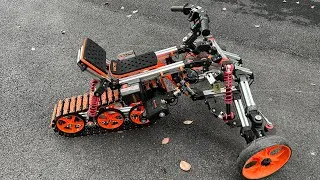 A children's tank tracked motorcycle composed entirely of 