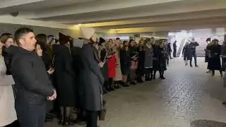 Christians worshipping while sheltering inside a subway station in Kyiv, Ukraine