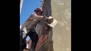 Great Old Man Skills In Construction To Render Brick Wall