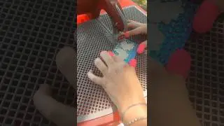 Dichroic glass jewelry being made with Taurus 3 ring saw. 