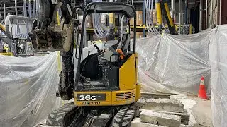 Indoor Concrete Removal. John Deere 26G Mini Excavator. Takeuchi Tl10v2 Skid Steer.