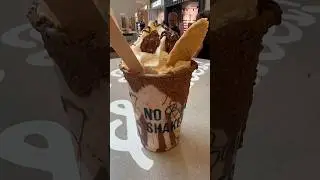 American in the UK tastes a Ferrero Rocher milkshake for the first time! #milkshake #shorts #uk #usa