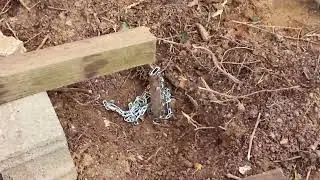 Using physics to lift concrete footing fence post in minutes