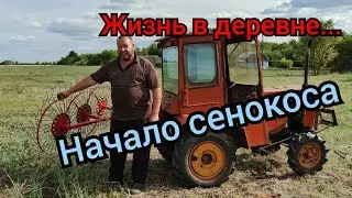 Life in the village. Working with a mini tractor. The walk-behind tractor broke down. A farm over...