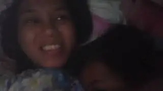 Breastfeeding mom sheding light to daughter