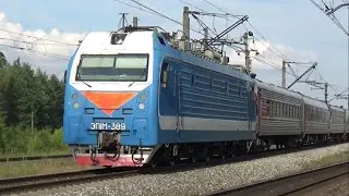Электровоз ЭП1М-389 с пассажирским поездом