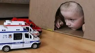 Senya plays with toy cars and rescues the Police and Fire trucks and Ambulance from the cave