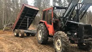 2) Valmet 705 loading sand in the woods on a Velsa70T boggietrailer tippbed