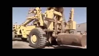 Самый большой трактор погрузчик в мире - прикол с людьми в ковше