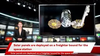 Solar panels are deployed on a freighter bound for the space station