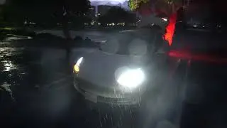 Tesla Light Show in the rain! Brand new super awesome feature!