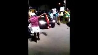 Daughter of APNU official urinates on PPP flag then sets it on fire