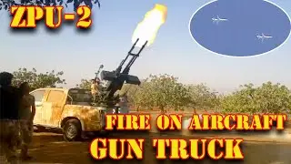 Gun-traks based on Toyota with ZPU-2 2x14.5mm KPV conduct anti-aircraft fire on aircraft
