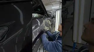 Paintless dent removal! Pulled out a large dent on the fender.