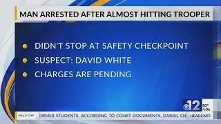 Jackson man arrested after almost hitting trooper conducting safety checkpoint