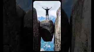 The Stone Stuck Between Two Mountains In Norway