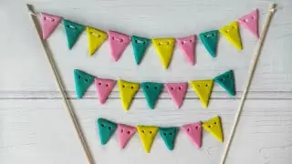 Cake flag garland. Flags made of fondant.