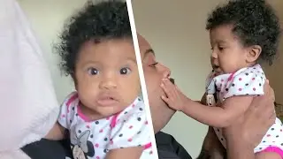 La bambina guarda sorpresa il papà – Qui c'è qualcosa che non va!