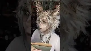 The Owlchemist Juniper reads a spicy book.