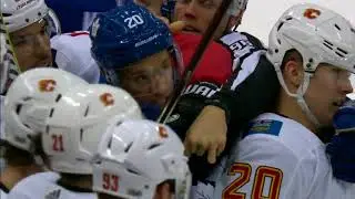 Calgary Flames Matthew Tkachuk delivers sneaky spear? to Matt Martin  from bench
