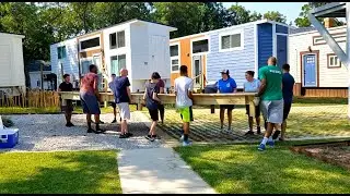 It takes a village to move a deck…even if it’s a Tiny House!