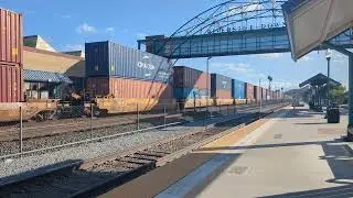BNSF 8150 leads double stack container train through Riverside Downtown Station