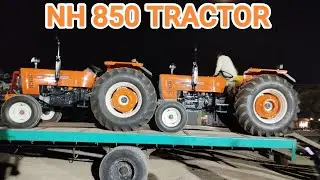 New Holland 850 tractor loading