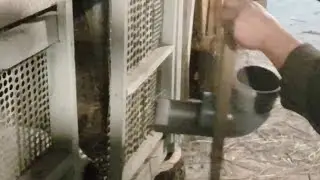 Rabbit feeder made from plumbing pipe.